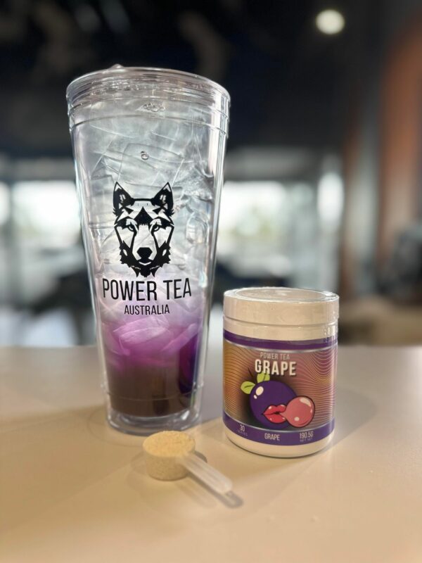 Power Tea Grape drink mix in a 32oz clear cup with ice
