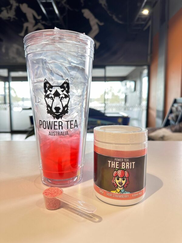 Power Tea The Brit drink mix in a 32oz clear cup with ice